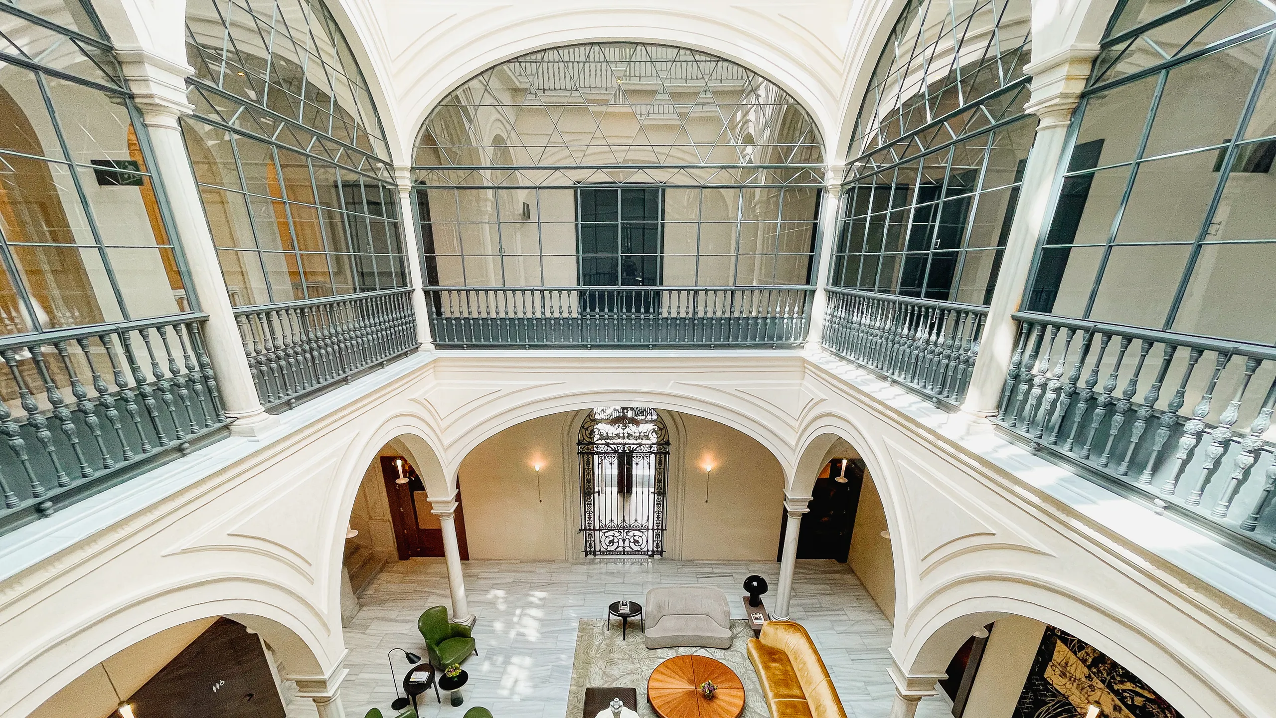 Columned interior patio of an old Seville house rising through two storeys